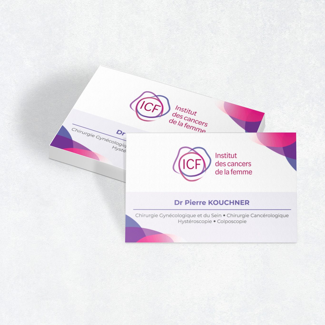 Institut des cancers de la femme Cartes de visite blanches avec logo ICF et éléments graphiques colorés.